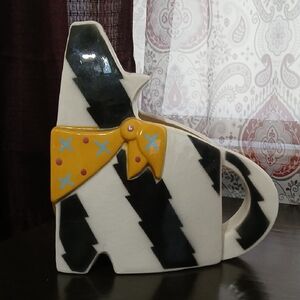 Ceramic Dog Figurine with Yellow Accents